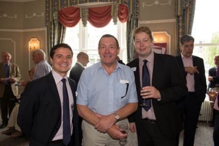 Raworths' Ervin Shakaj and Matt Hill with Michael Baxter (centre)