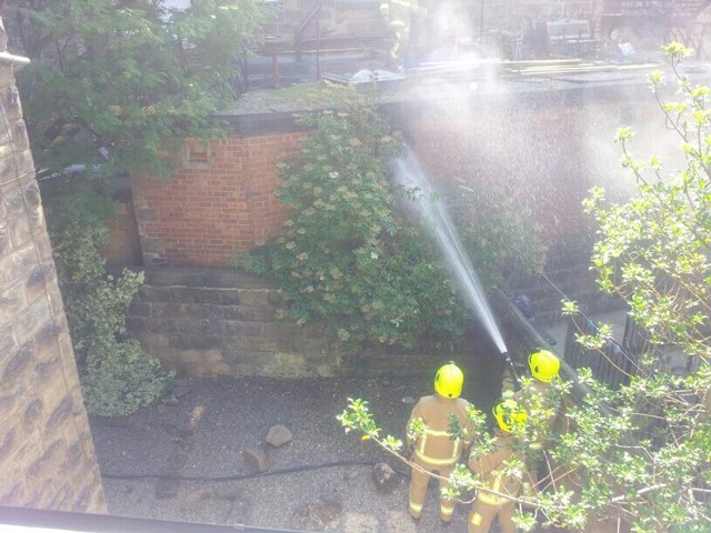 Fire fighters at the rear of the Regency