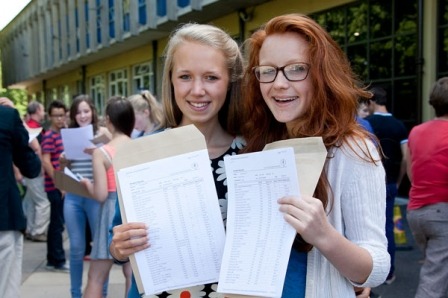 Alice Bryant and Eloise Dunn with their GCSE results at Saint John Fisher Catholic High School