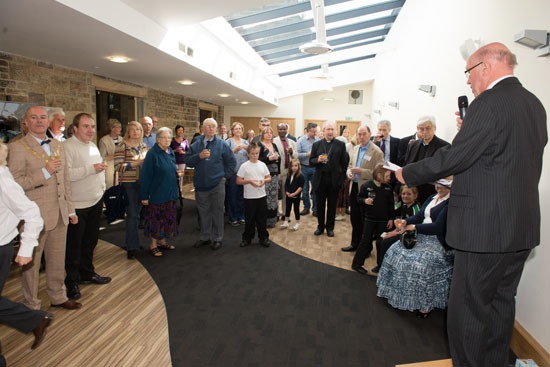 Mike Langford addresses the crowd of local people and dignitaries