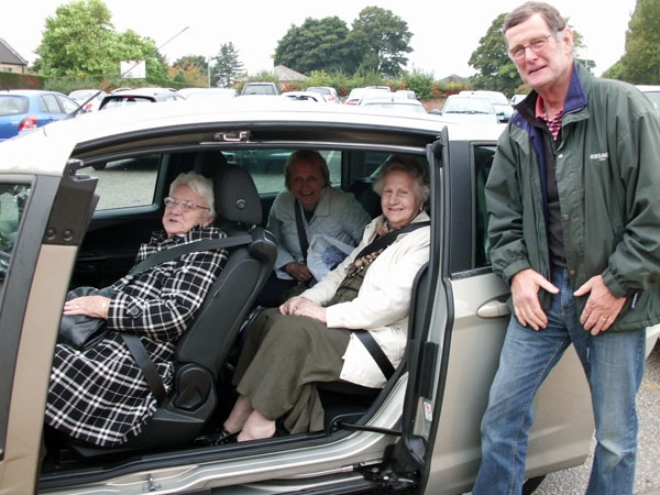 Benfield’s Philip Mitchell with members of Opening Doors