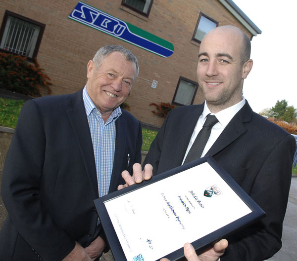 (L to R) at S&B Utilities headquarters in Knaresborough are managing director Keith Swales and foreman electrician, Jodi Beales, who was promoted after gaining an electrical engineering degree at Leeds Metropolitan University after completing a course funded by S&B Utilities.