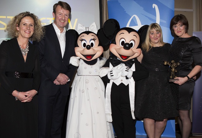 (L-R) Anna Hill, Disney Chief Marketing Officer, Mike Stagg Disney VP of Retail, Mickey Mouse and Minnie Mouse, Lisa Steane Senior Category Manager (HSTV) and Lisa Fawcett Product Director (HSTV)