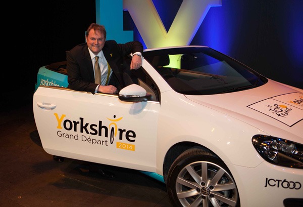 Gary Verity with one of the Tour de France publicity cars for 2013/14 Gary Verity with one of the Tour de France publicity cars for 2013/14