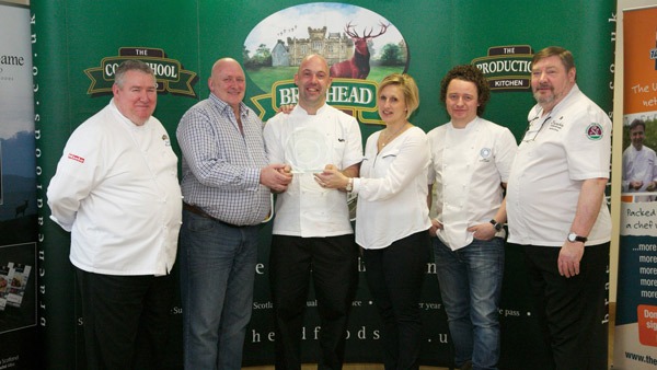 Winner with judges, Braehead MD Craig Stevenson and sponsor Highland Game