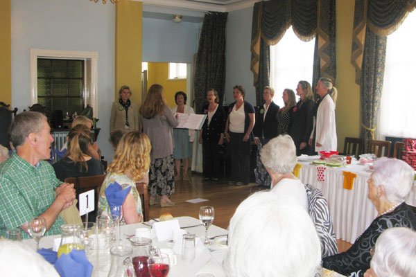 The Yorkshire Decibelles perform to the luncheon guests