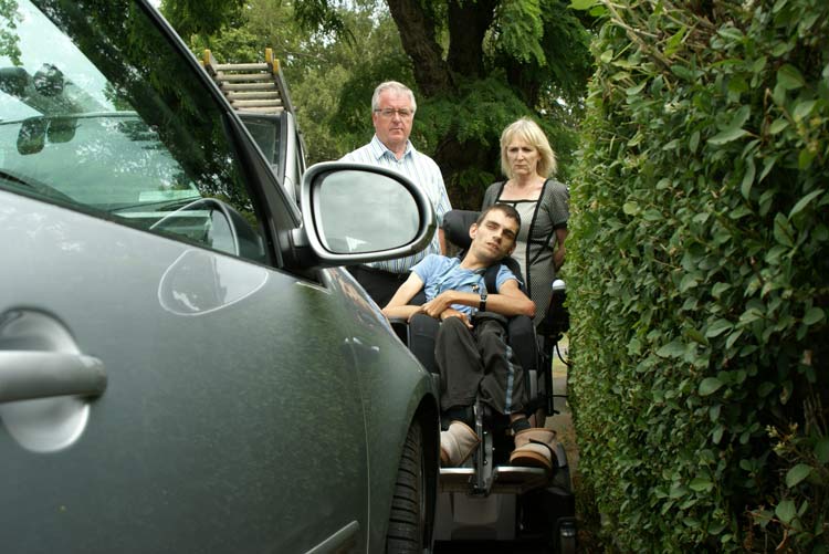 Problem Parking! A car blocks the path of (from left) Coun John Fox, Nick Moxon and DisabilityAcation Yorkshire chief executive Jackie Snape