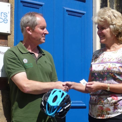 Just the ticket....Nick Smith collects his prize from Anne Wells, of the Carers' Resource