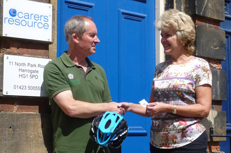 Just the ticket....Nick Smith collects his prize from Anne Wells, of the Carers' Resource
