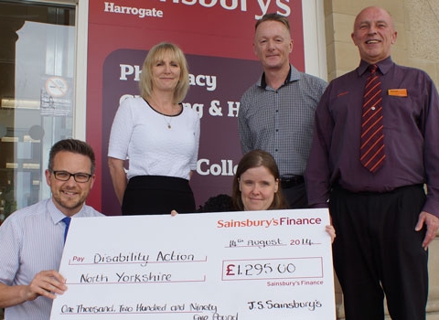 “Chequing Out” With Thanks! Pictured are (from left) Sainsbury supermarket Deputy Manager Paul Clayton, Disability Action Yorkshire Chief Executive Jackie Snape, Disability Action Yorkshire resident Kirsty Walker, Disability Action Yorkshire Care Manager Steven Taylor and Sainsbury PR Ambassador Richard Slack