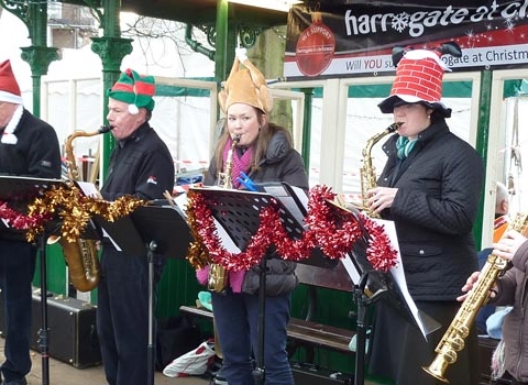 Musicians performing in the busking area at Harrogate Christmas Market in 2013