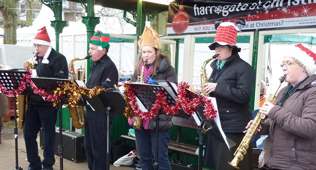 Musicians performing in the busking area at Harrogate Christmas Market in 2013