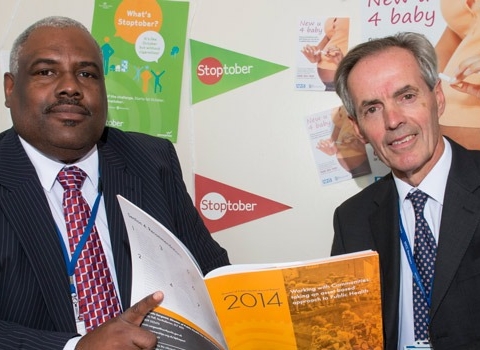County Councillor Don Mackenzie and Dr Lincoln Sargeant with the report and smoking in pregnancy campaign material
