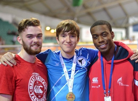 Rossett School student Thomas Henley, centre, has been chosen to compete for England’s taekwondo team this November. He is pictured with the winner of the under 80kg senior category at the British National Championships in 2014, and Olympic bronze medallist Lutalo Muhammed.