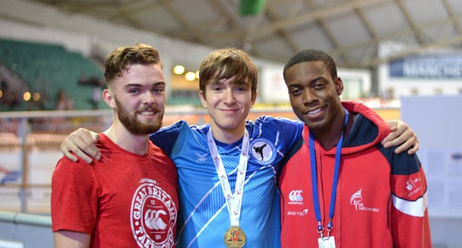 Rossett School student Thomas Henley, centre, has been chosen to compete for England’s taekwondo team this November. He is pictured with the winner of the under 80kg senior category at the British National Championships in 2014, and Olympic bronze medallist Lutalo Muhammed.