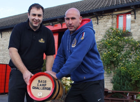 Riding High! Kris Stephenson (right) And Theakston’s Cooper, Jonathan Manby, with the four-and-a-half gallon Base Camp Challenge Cask