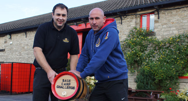 Riding High! Kris Stephenson (right) And Theakston’s Cooper, Jonathan Manby, with the four-and-a-half gallon Base Camp Challenge Cask
