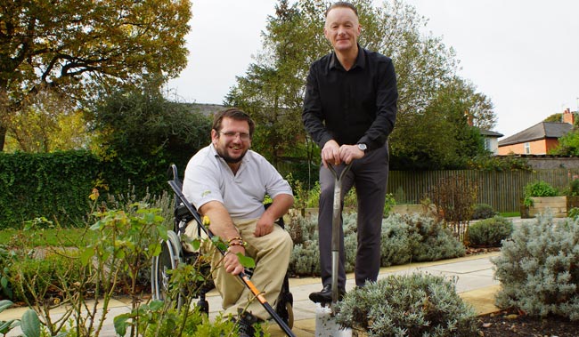 Can You Help? Disability Action Yorkshire Care Home Manager Steven Taylor with resident Darren Asquith in the home’s garden