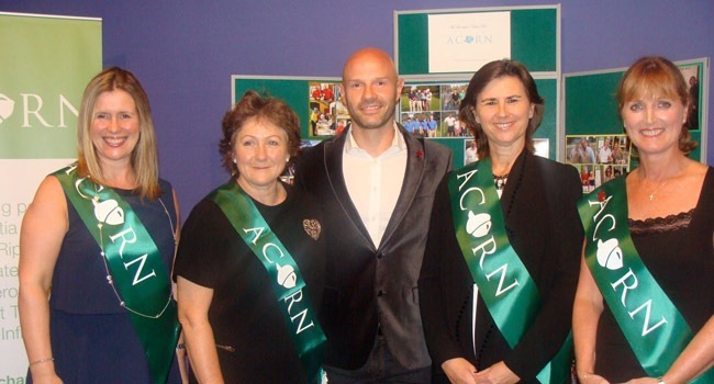 Acorn's Rachel Woodward, Anna Wray, Louise Hanen and Maria Dawson pictured with England footballer Danny Mills