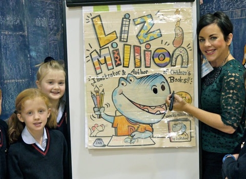 (L to R) Year 4 pupils William Woods, Erin Nattress, Sacha Rhodes and Zak Watson with author Liz Million