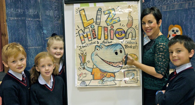 (L to R) Year 4 pupils William Woods, Erin Nattress, Sacha Rhodes and Zak Watson with author Liz Million