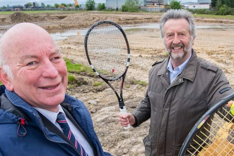 (L to R) are head of Barber Titleys property department, Richard Davis, a partner, with Nigel Bentley of Harrogate Spa Tennis Centre. Work on Phase One of the centre is in progress in the background
