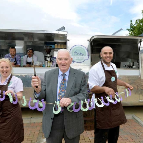 Raymond Twiddle, Chairman of Yorkshire Event Centre Ltd officially opens the Fodder Airstream, accompanied by Emma Lund and Mehdi Boukemach as Tibor Fodor-Nagy and Cicero Souza look on