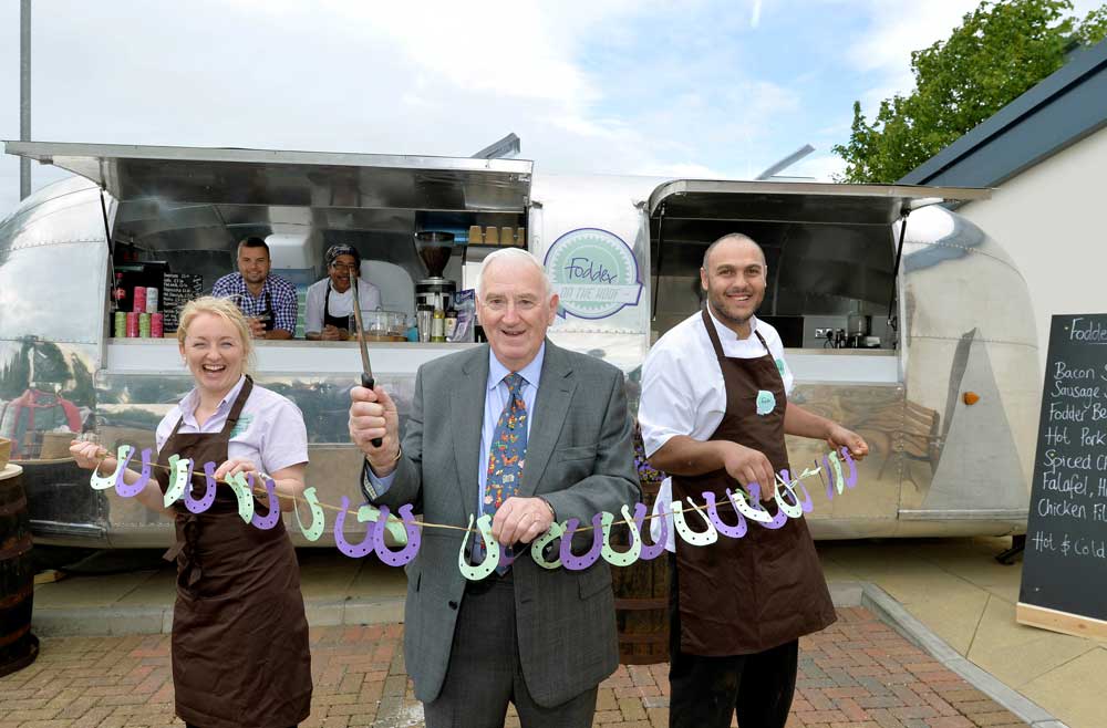 Raymond Twiddle, Chairman of Yorkshire Event Centre Ltd officially opens the Fodder Airstream, accompanied by Emma Lund and Mehdi Boukemach as Tibor Fodor-Nagy and Cicero Souza look on