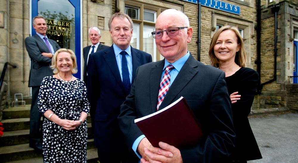 Barber Titleys and LCF Law merge - Back left to right Tim Axe and Tim Mellors from Barber Titleys, centre left to right Judith Long from Barber Titleys and Simon Stell from LCF Law, front left to right Richard Davis from Barber Titleys and Susan Clark from LCF Law