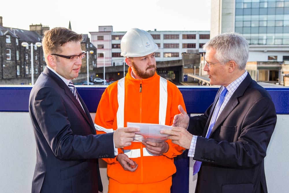 Richard Allan, Commercial Director for Northern Rail, Jack Halewood of Consortia Integrated Services and Andrew Jones MP, Parliamentary Under Secretary of State in the Department for Transport at Harrogate