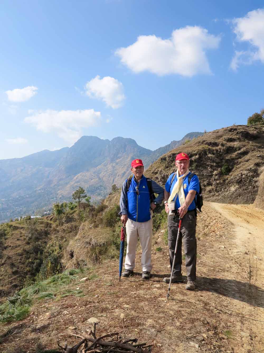Major Lil Gurung MBE of the Himalayan Gurkhas Rotary Club (Kathmandu) with Barry Pollard (Project Leader) of Harrogate Brigantes Rotary Club - walking between schools in the Panchamul Valley