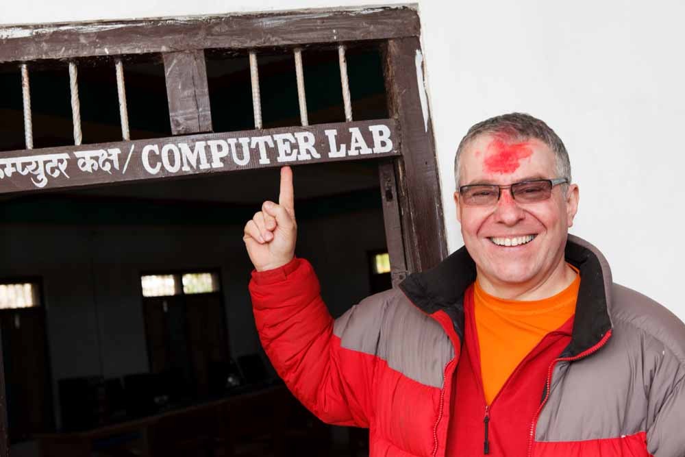 Rotarian and IT Expert Andy Morrison (Andisa IT) proudly shows off the new IT Suite at Sarbodaya Higher Secondary School, Aruchaur