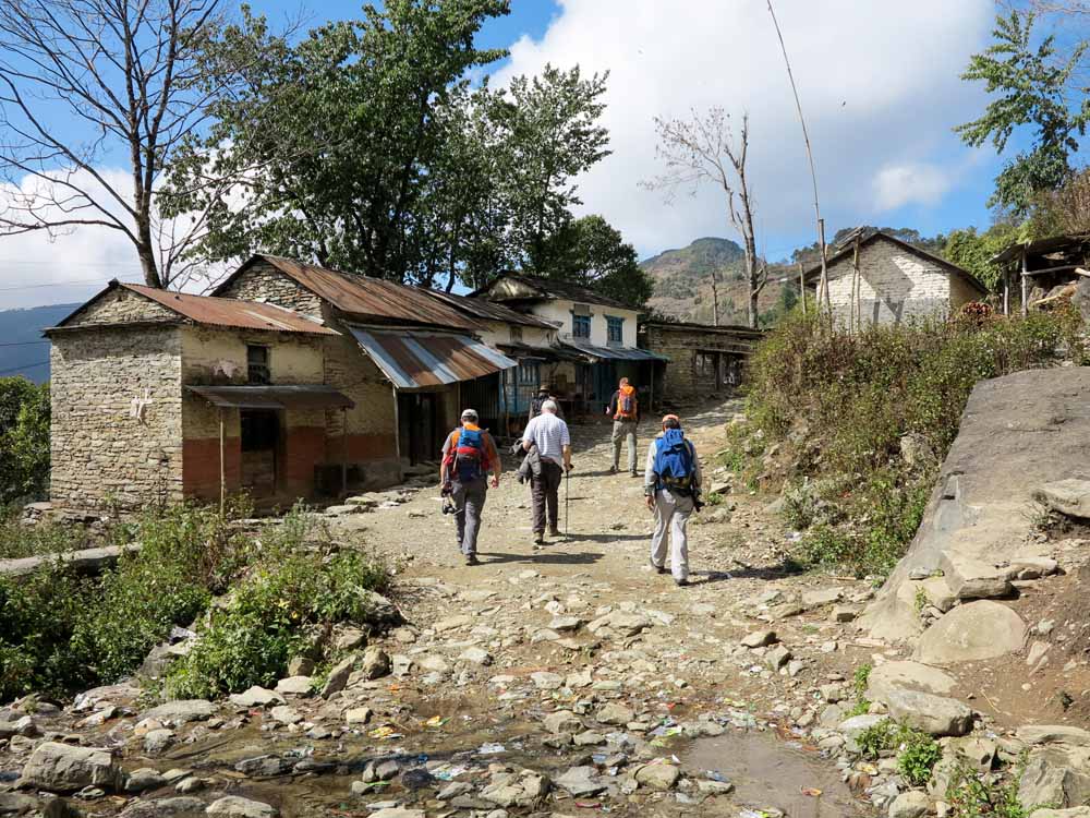 Project team members walk to Sarbodaya Higher Secondary School in Aruchaur, Panchamul Valley to begin IT training for the teachers