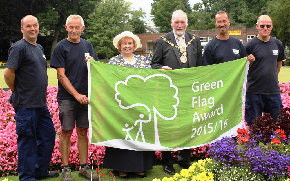 The Mayor of the Borough of Harrogate, Councillor Nigel Simms, and the Mayoress, presenting the parks team at Ripon’s Spa Gardens with their 15th consecutive Green Flag Award, August 2015