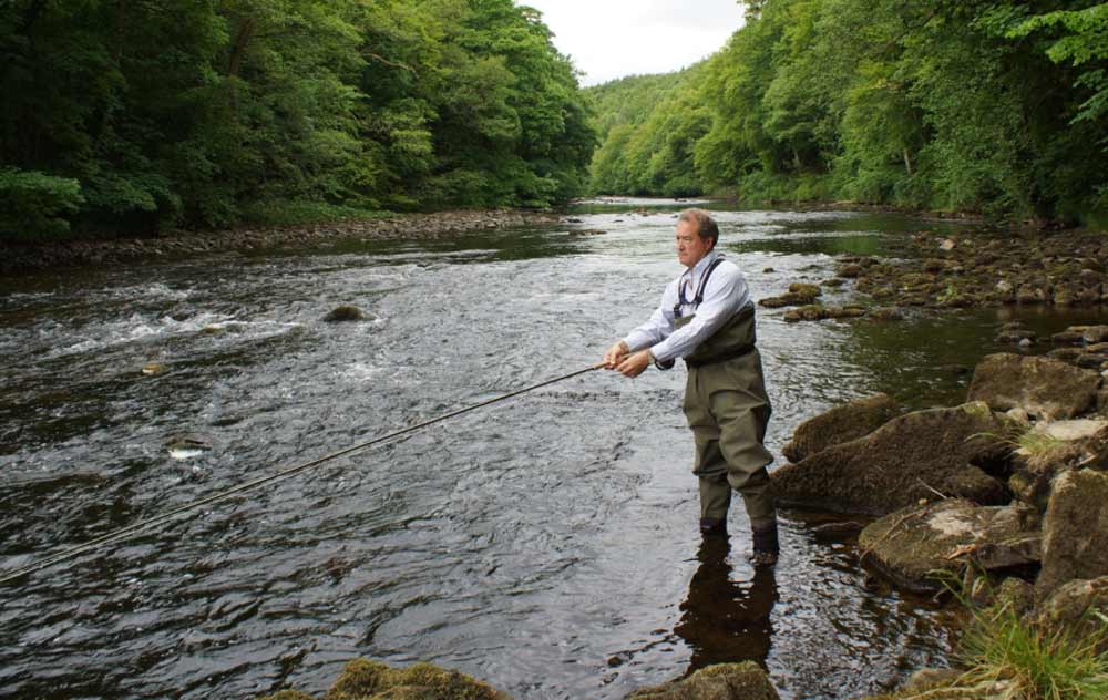 Salmon Fisher! Ure Salmon Trust director Oliver Leatham fishes for salmon on the River Ure