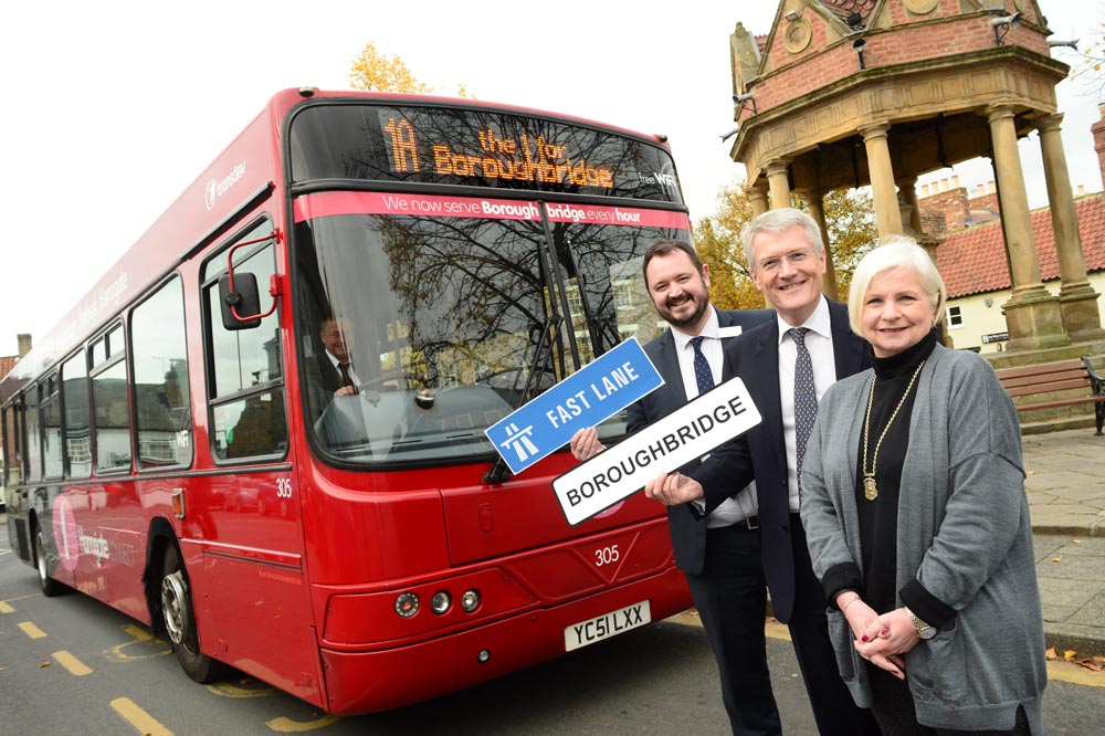 Chief Executive at Transdev Alex Hornby, Parliamentary Under Secretary of State for Transport and MP for Harrogate and Knaresborough, Andrew Jones, and Boroughbridge Deputy Mayor Liz Vose, launch Transdev’s new service in Boroughbridge