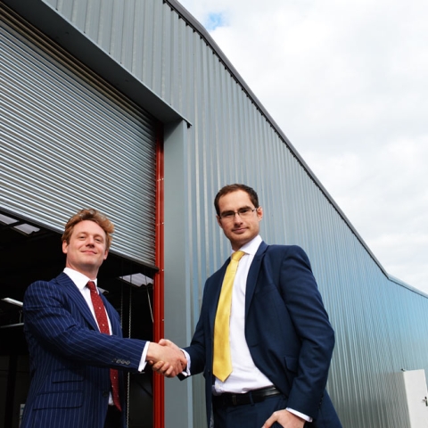 Prescott of Knight Frank (left) with Matthew Brear of Dacres Commercial (right) outside the building