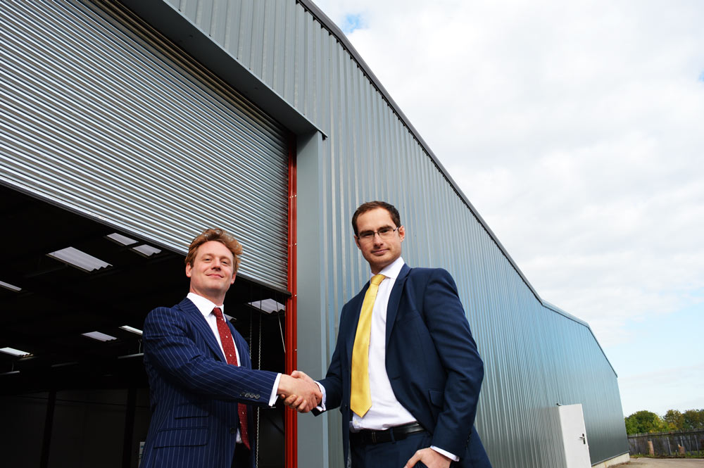 Prescott of Knight Frank (left) with Matthew Brear of Dacres Commercial (right) outside the building
