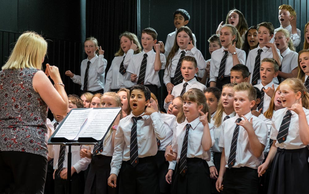 Year 7 students perform at the September Surprise concert, which showcases everything they have learned in the first month at Rossett School