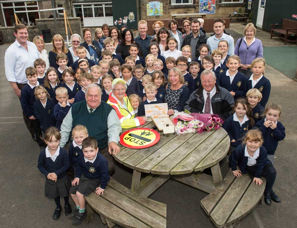 County Councillor John Fort - left - with Mary Fisher and staff and pupils from Summerbridge Community Primary School