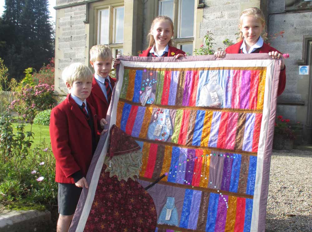 Year 6 pupils at Belmont Grosvenor School with their winning quilt, from left to right, Oscar Chary, Paul Atkinson, Matilda Tasker and Libby Wilson