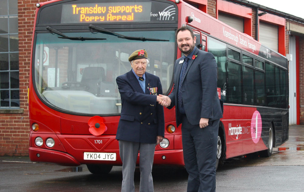 D-Day Veteran and President of the Knaresborough Branch of the Royal British Legion, Ken Haw, and chief executive at Transdev Alex Hornby stand alongside one of the company’s poppy buses