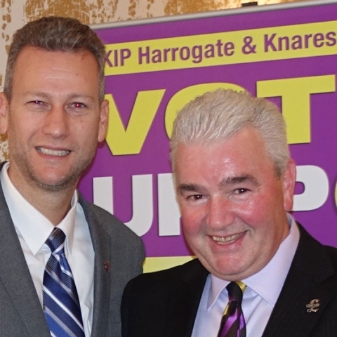 MEP Nathan Gill Speaks At UKIP’s Harrogate & Knaresborough Branch (for immediate release) The forthcoming referendum on the UK’s membership of the European Union was one of the topics covered by an MEP at a political meeting held in Harrogate. Nathan Gill, the UKIP MEP for Wales, was the guest speaker at the party’s Harrogate & Knaresborough branch meeting, held at the Ascot House Hotel. Mr Gill, who was born in East Yorkshire, told the audience how he first got involved in politics and of his subsequent election campaigns and going head to head in TV debates with Plaid Cymru leader, Leanne Wood. Last year, Mr Gill was made leader of the Party in Wales, and, next year, will be fighting for a seat in the Welsh Assembly. Alan Henderson, chairman of UKIP Harrogate & Knaresborough, said: “I would like to thank Nathan for taking the time out of his hectic schedule to attend our meeting. “His visit was very much appreciated by members and non member alike, and he gave a fascinating insight into the functions of the European Union and its wastefulness. “He also gave us his views on the EU referendum promised by David Cameron, and how, if the UK voted to leave, it would give other countries the strength to hold their own.” The meeting also heard from UKIP county councillor David Simister, who gave an update on the authority’s proposals to introduce parking charges in Harrogate town centre on a Sunday and evenings. Further details about the next meeting, which is being held on the evening of Thursday, December 10 at the Ascot House Hotel on Kings Road, Harrogate, are available on the branch’s website, http://www.ukipharrogate.org -ends- Pictured are: UKIP MEP Nathan Gill (left) and Alan Henderson, chairman of UKIP Harrogate & Knaresborough