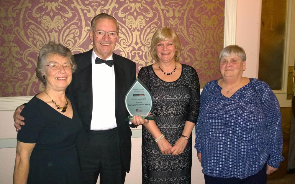 Perlex team: Beryl and Brian Dunsby, Maggie Hall and Chris Muir, collecting an award for Harrogate Christmas Market earlier this year