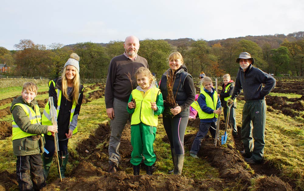 Planting for the Future -  Pictured from left are; Bertie Graham-Bell, Emma Beresford, Michael Emsley, Poppy Spice, Coun Helen Flynn, Olivia Johnson and Phil Lyth