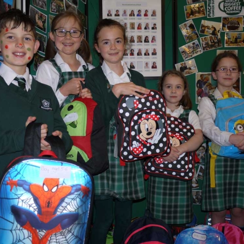Brackenfield pupils with some of the rucksacks on Children in Need Day, hence the spots!