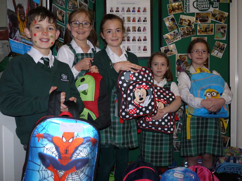 Brackenfield pupils with some of the rucksacks on Children in Need Day, hence the spots!