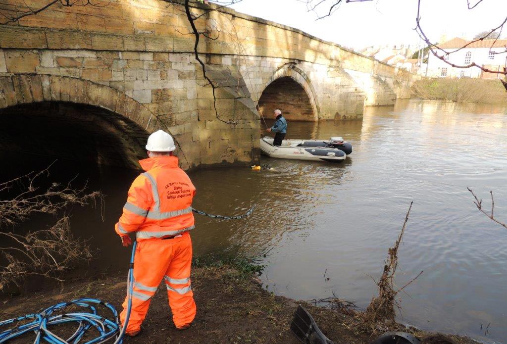 North Yorkshire County Council’s bridge engineers inspect the collapsed River Wharfe bridge at Tadcaster