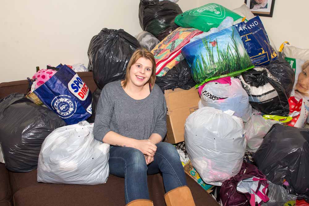 Alice with some of the donations