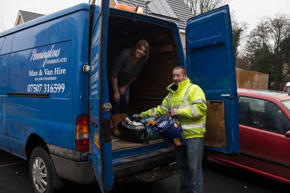 Alice with Mark Pennington, loading one of the vans